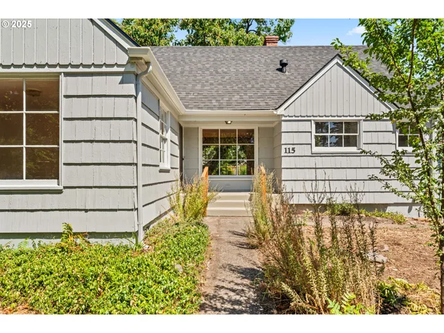 a house view with a garden space