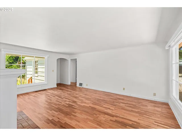 a view of an empty room and window