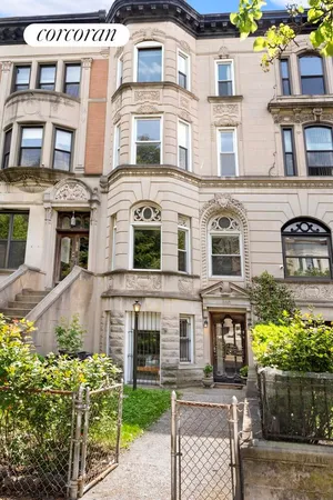 a front view of a multi story residential apartment building