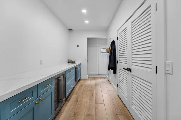 a bathroom with a sink a toilet and a shower