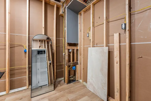 a view of a deck with wooden floor and fence