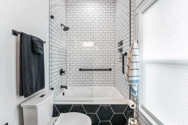 a view of a house with a yard balcony