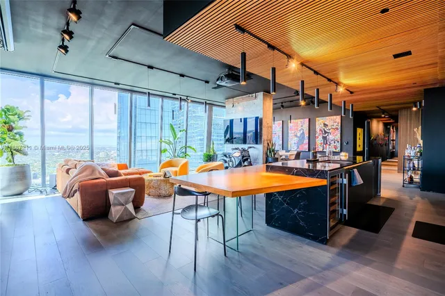 a room with furniture and a large window