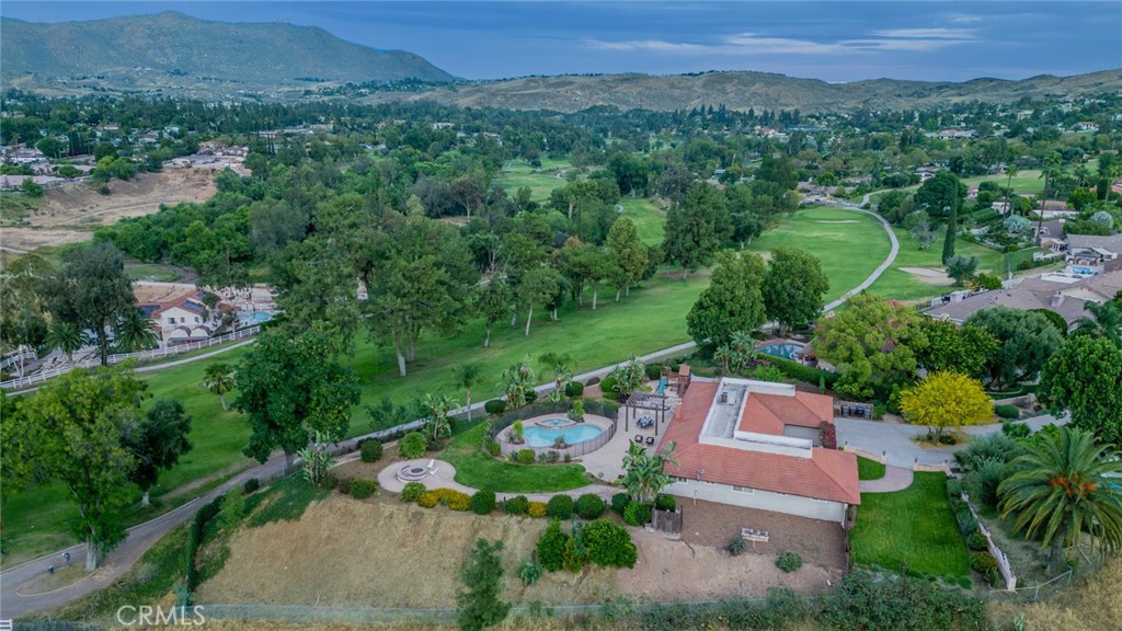 an aerial view of a house with a garden