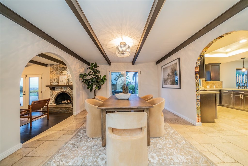 5300 Vía San Jacinto Riverside, CA 92506 - Photo 14 of 59 a view of living room kitchen with furniture and fireplace