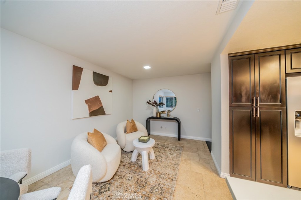 5300 Vía San Jacinto Riverside, CA 92506 - Photo 22 of 59 a living room with furniture and a table