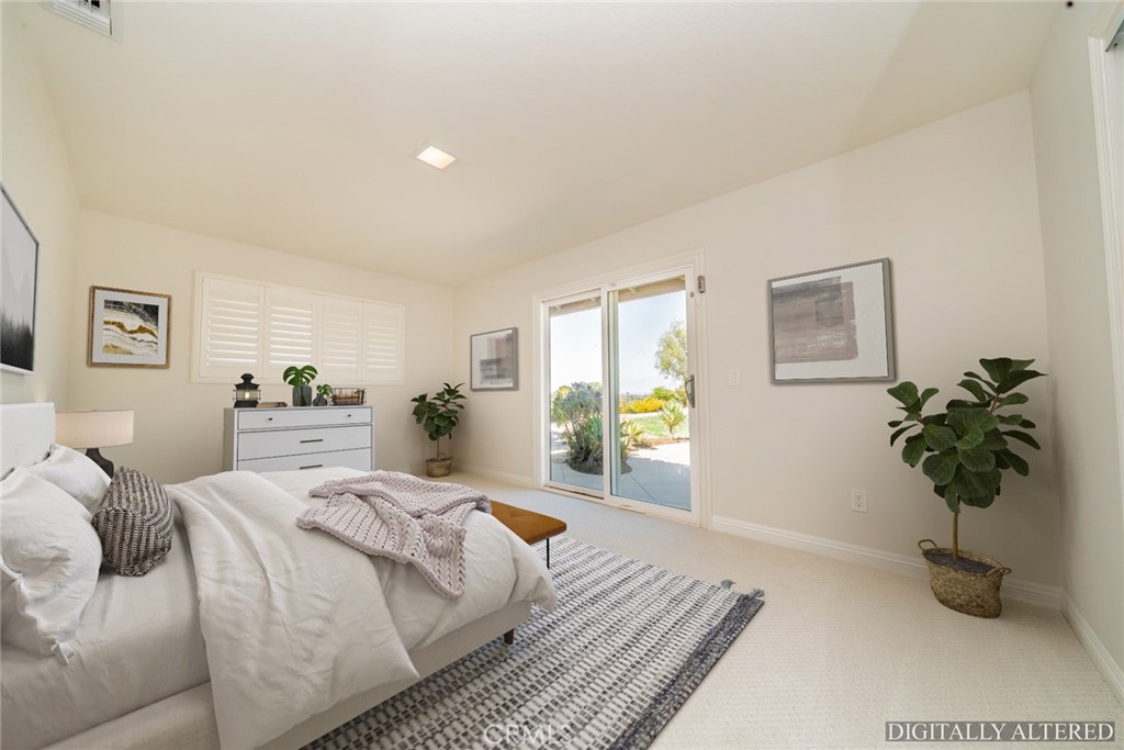 5300 Vía San Jacinto Riverside, CA 92506 - Photo 35 of 59 a bedroom with a bed a dresser and paintings on the wall
