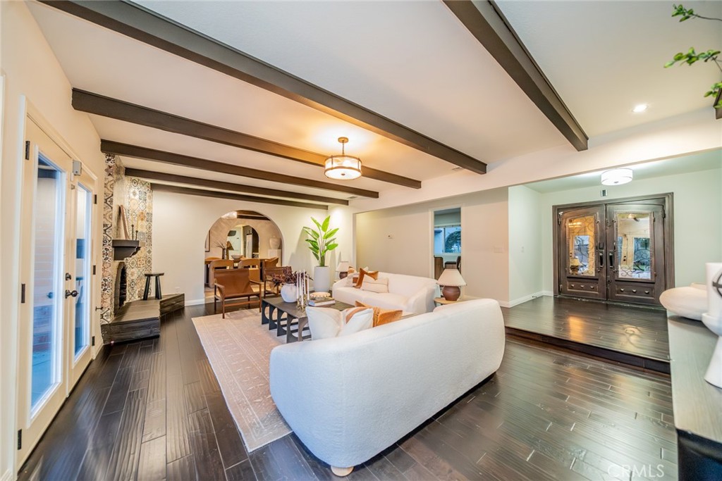 5300 Vía San Jacinto Riverside, CA 92506 - Photo 9 of 59 a living room with fireplace furniture and a wooden floor