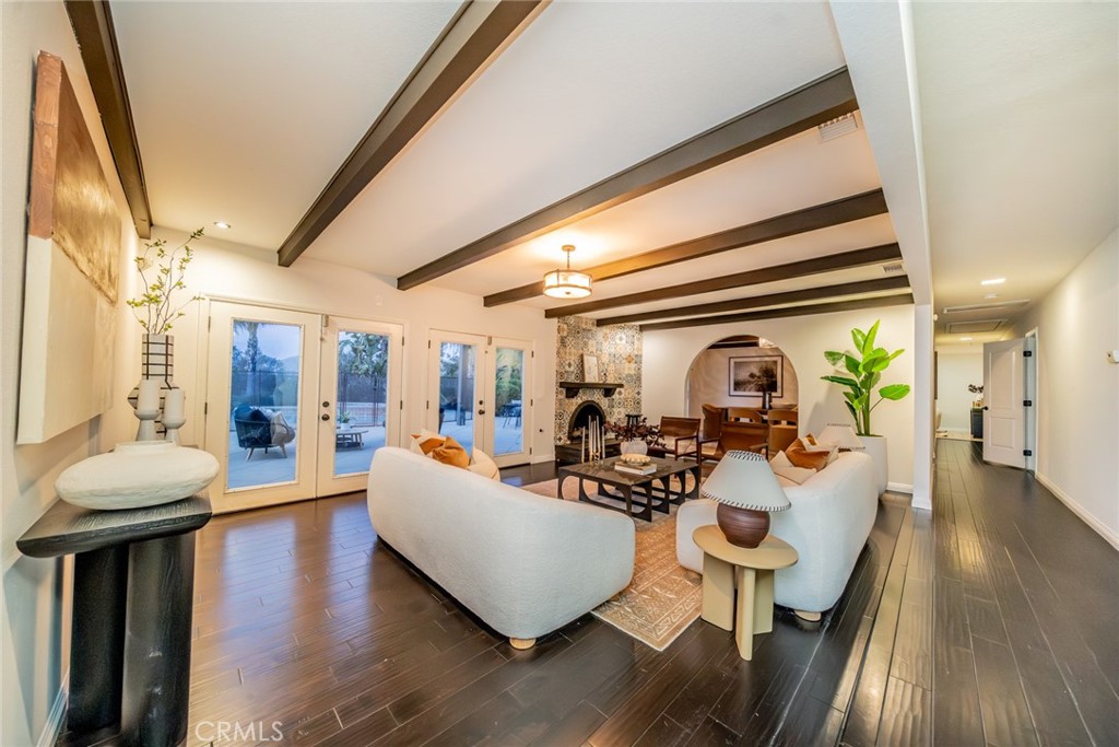 5300 Vía San Jacinto Riverside, CA 92506 - Photo 10 of 59 a living room with fireplace furniture and a wooden floor