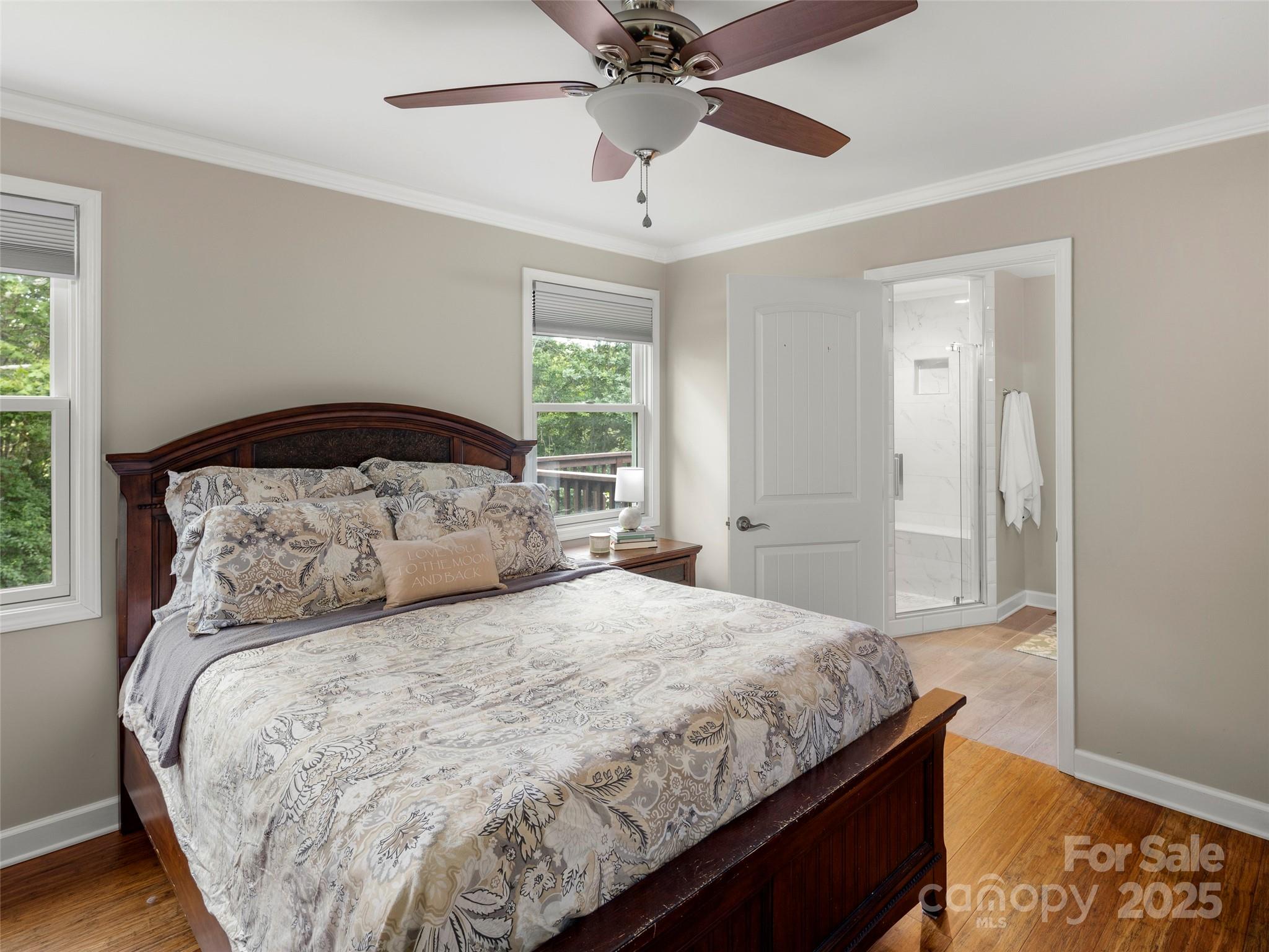 269 Adams Drive Clyde, NC 28721 - Photo 20 of 32 a bedroom with a bed and a window