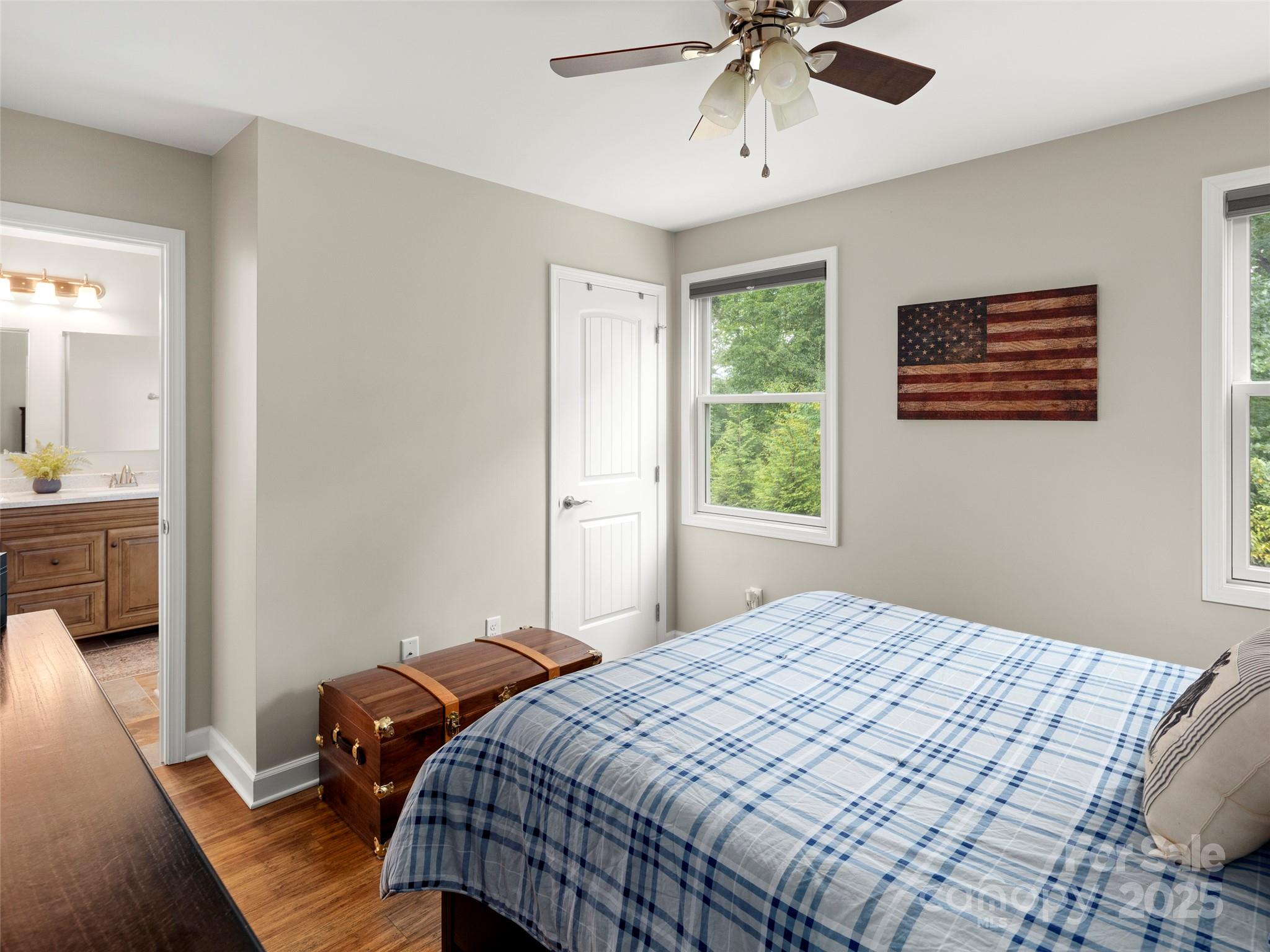 269 Adams Drive Clyde, NC 28721 - Photo 23 of 32 a bedroom with a bed and a window