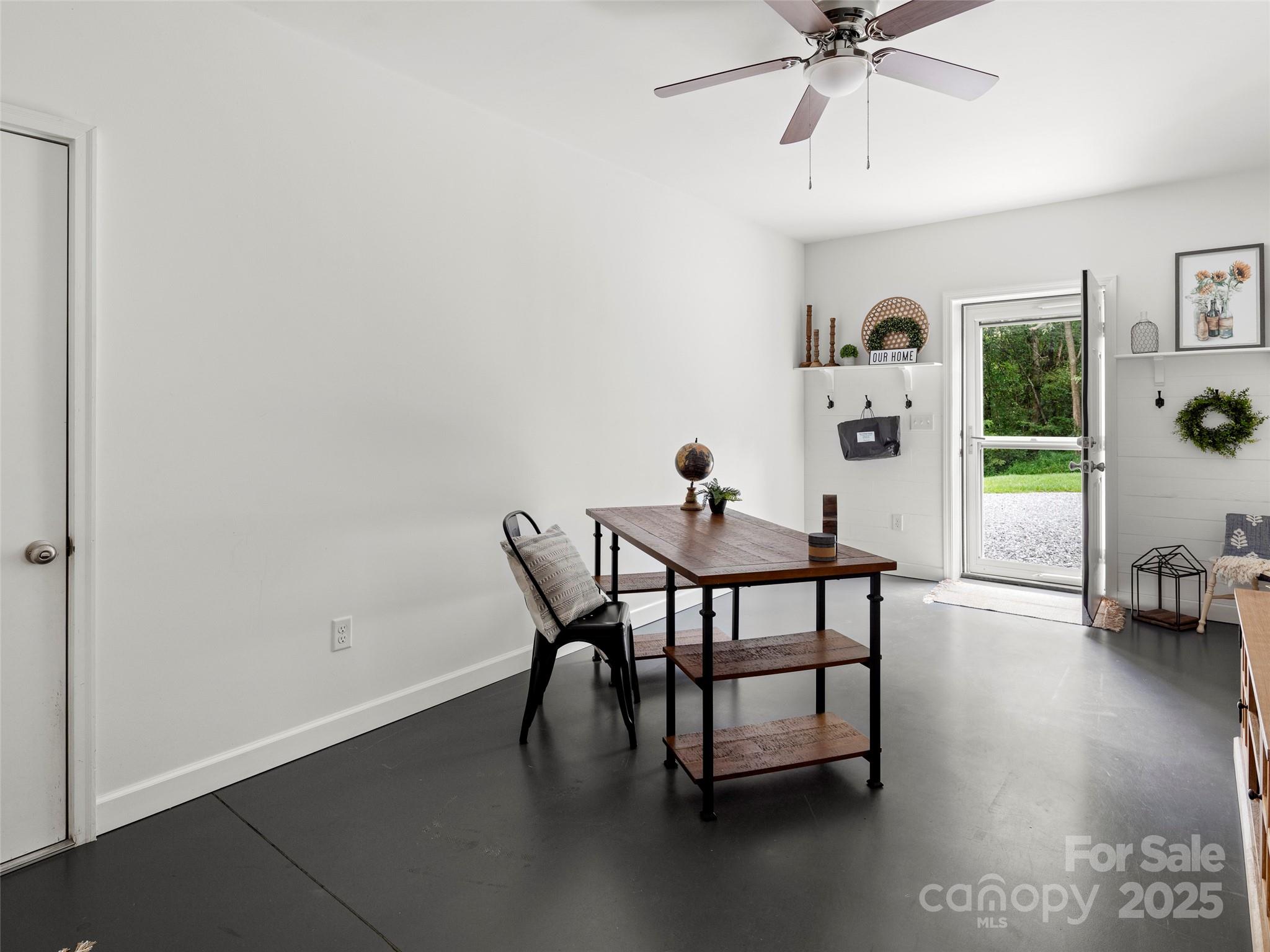 269 Adams Drive Clyde, NC 28721 - Photo 25 of 32 a dining room with furniture and window