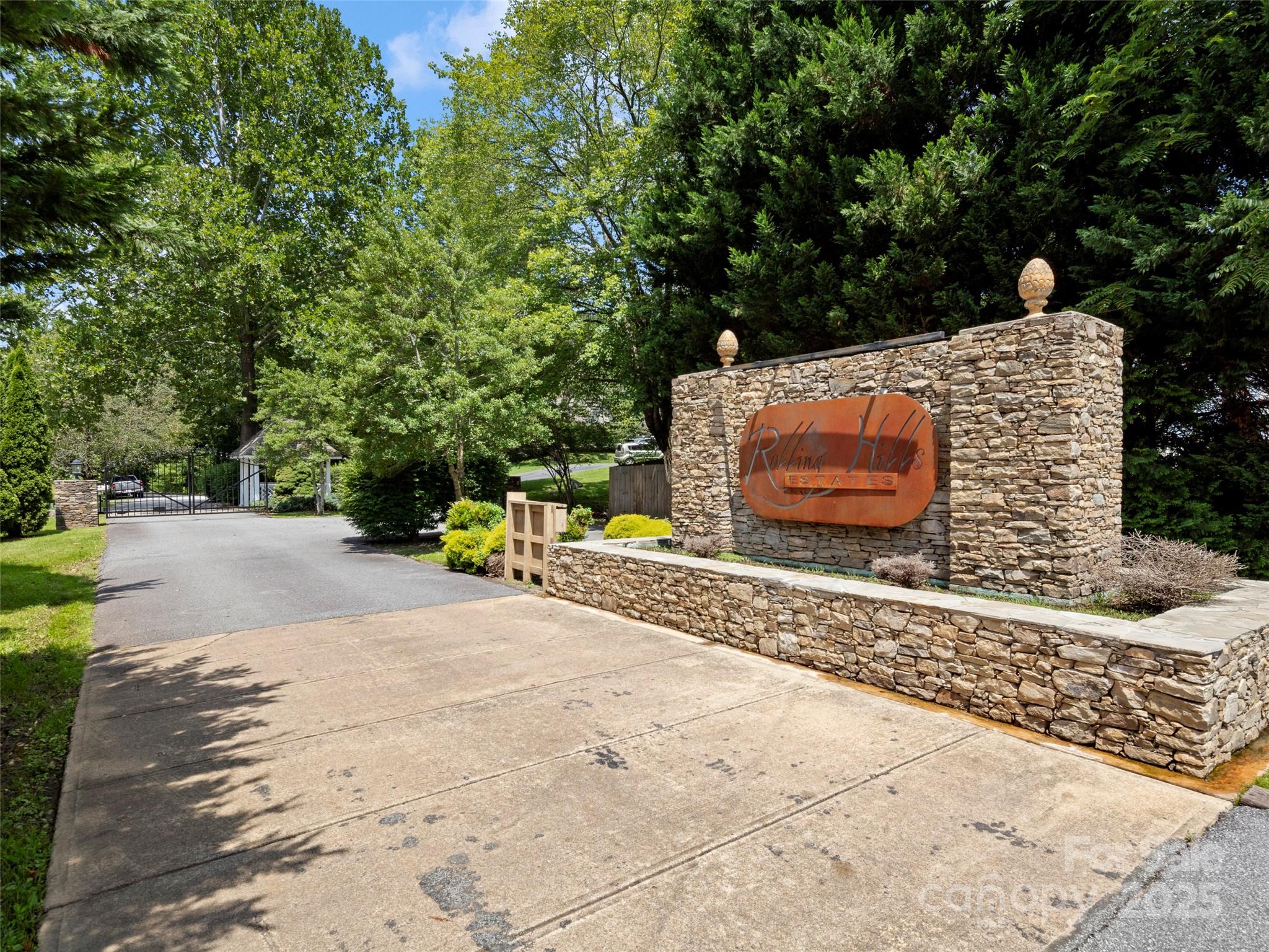 269 Adams Drive Clyde, NC 28721 - Photo 32 of 32 a backyard of a house with barbeque oven