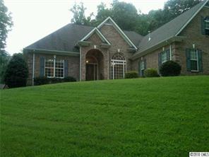 3004 Duck Point Drive Monroe, NC 28110 - Photo 1 of 15 a front view of a house with a yard