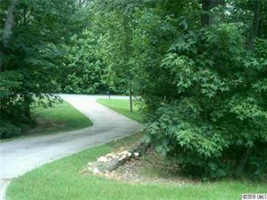 3004 Duck Point Drive Monroe, NC 28110 - Photo 13 of 15 a view of a street with a yard