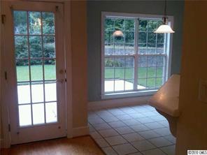3004 Duck Point Drive Monroe, NC 28110 - Photo 3 of 15 a bed sitting in a bedroom next to a window