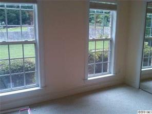 3004 Duck Point Drive Monroe, NC 28110 - Photo 9 of 15 an empty room with a window