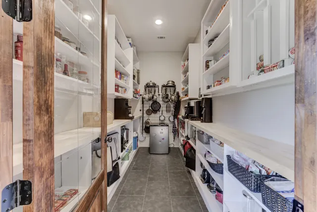 a bed room with furniture and a window