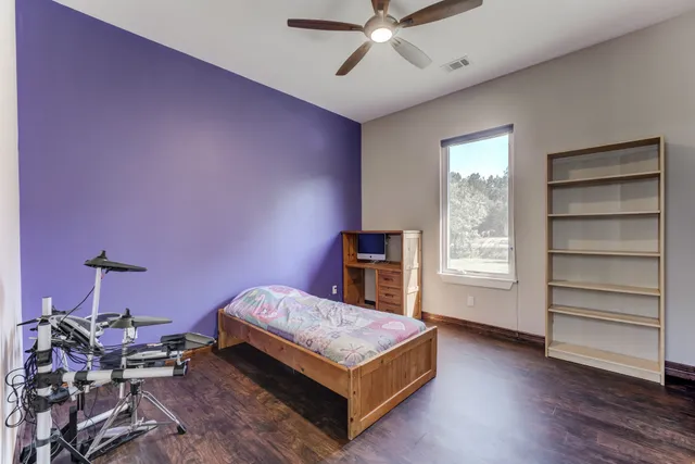 a room with furniture and a window