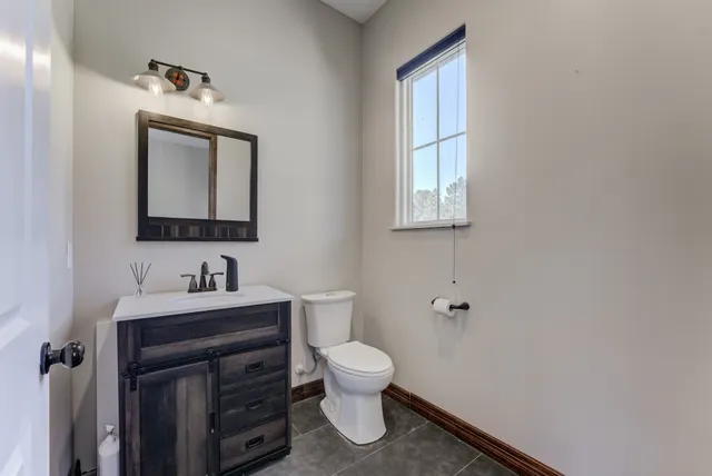 a view of a house with backyard