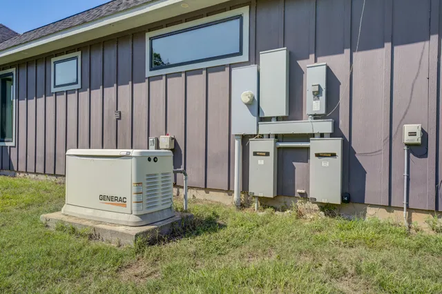 a aerial view of a house with a yard