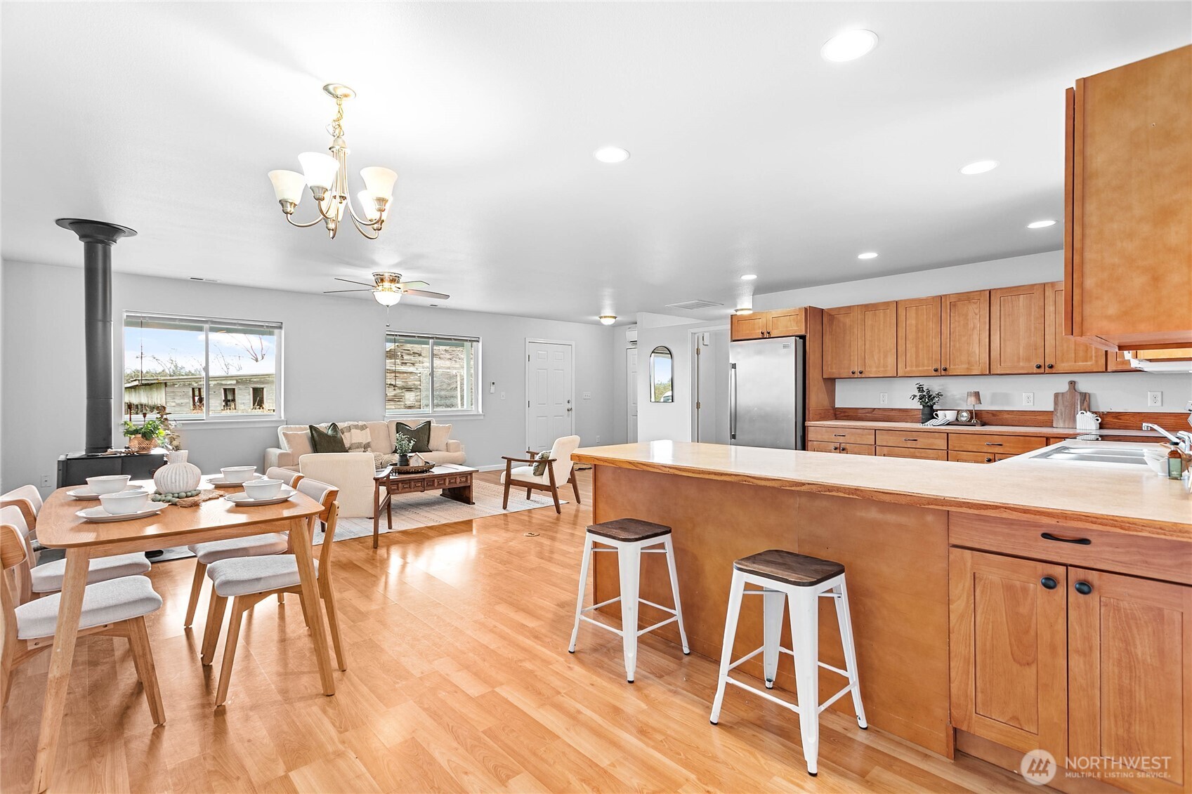 303 Hayes Street Nooksack, WA 98276 - Photo 12 of 40 a kitchen with a table and chairs in it