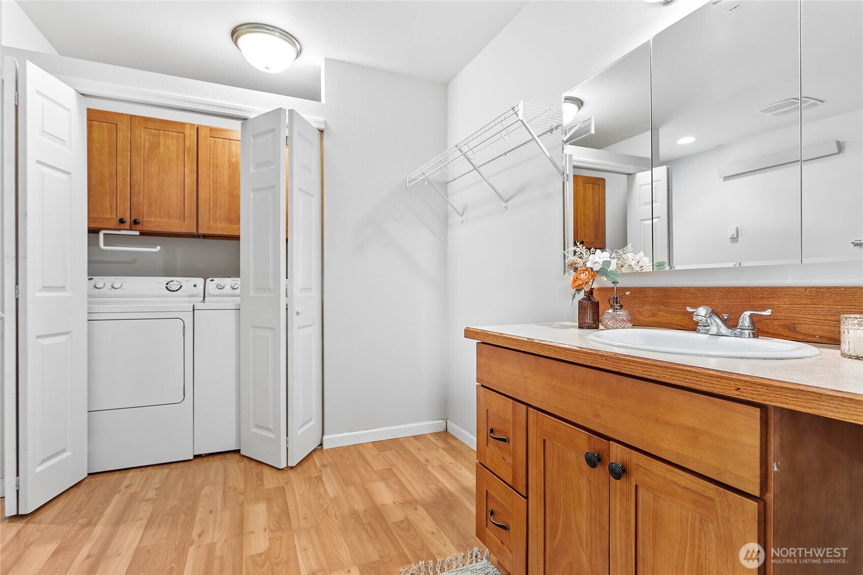 303 Hayes Street Nooksack, WA 98276 - Photo 19 of 40 a view of a kitchen with wooden floor
