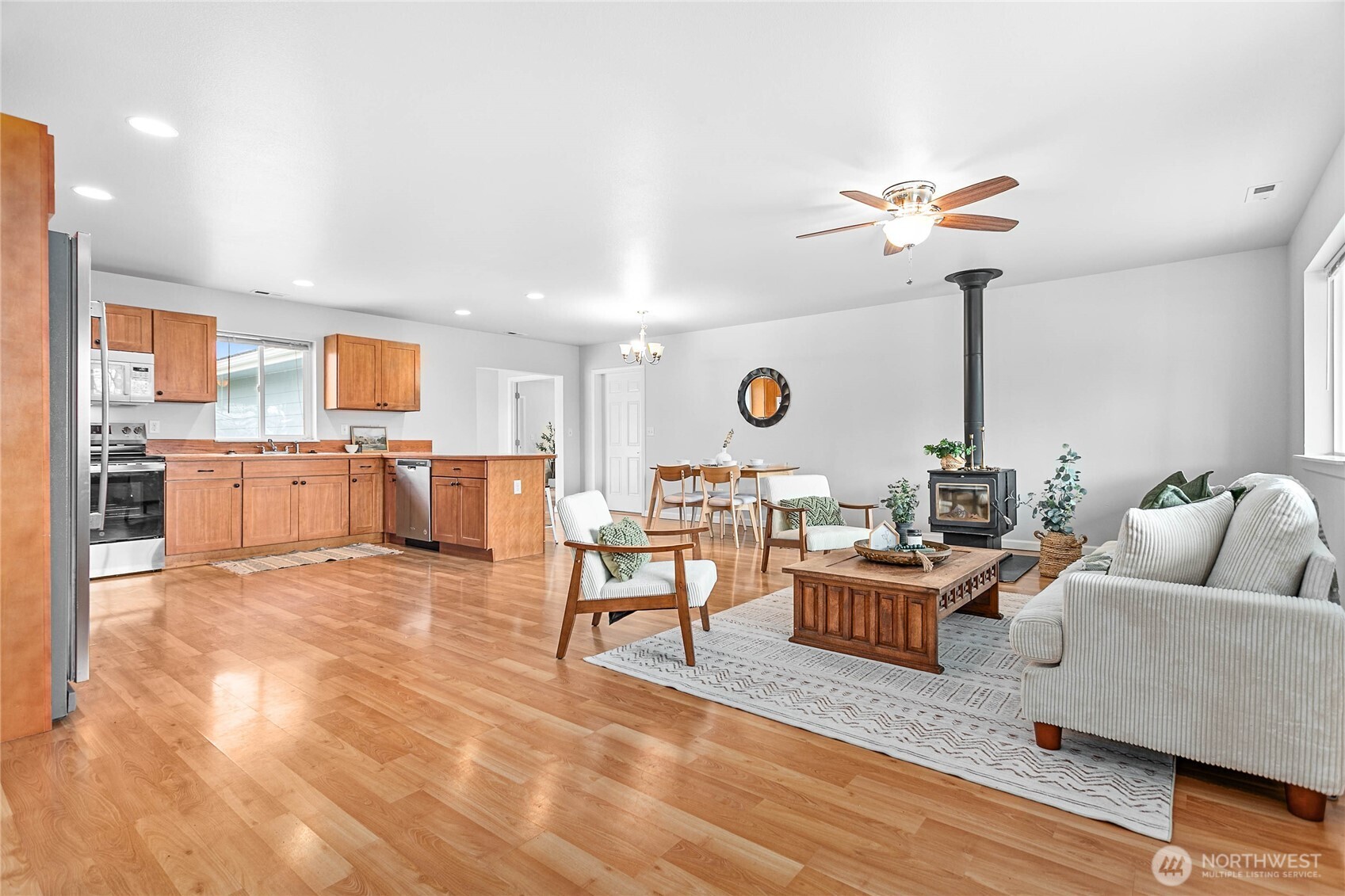 303 Hayes Street Nooksack, WA 98276 - Photo 3 of 40 a living room with furniture and a kitchen