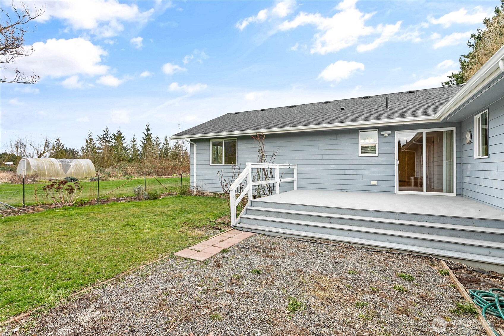 303 Hayes Street Nooksack, WA 98276 - Photo 32 of 40 a front view of a house with a yard