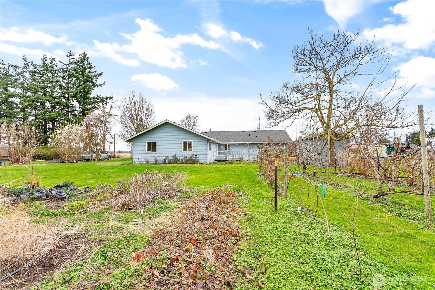 303 Hayes Street Nooksack, WA 98276 - Photo 37 of 40 a view of house with a big yard