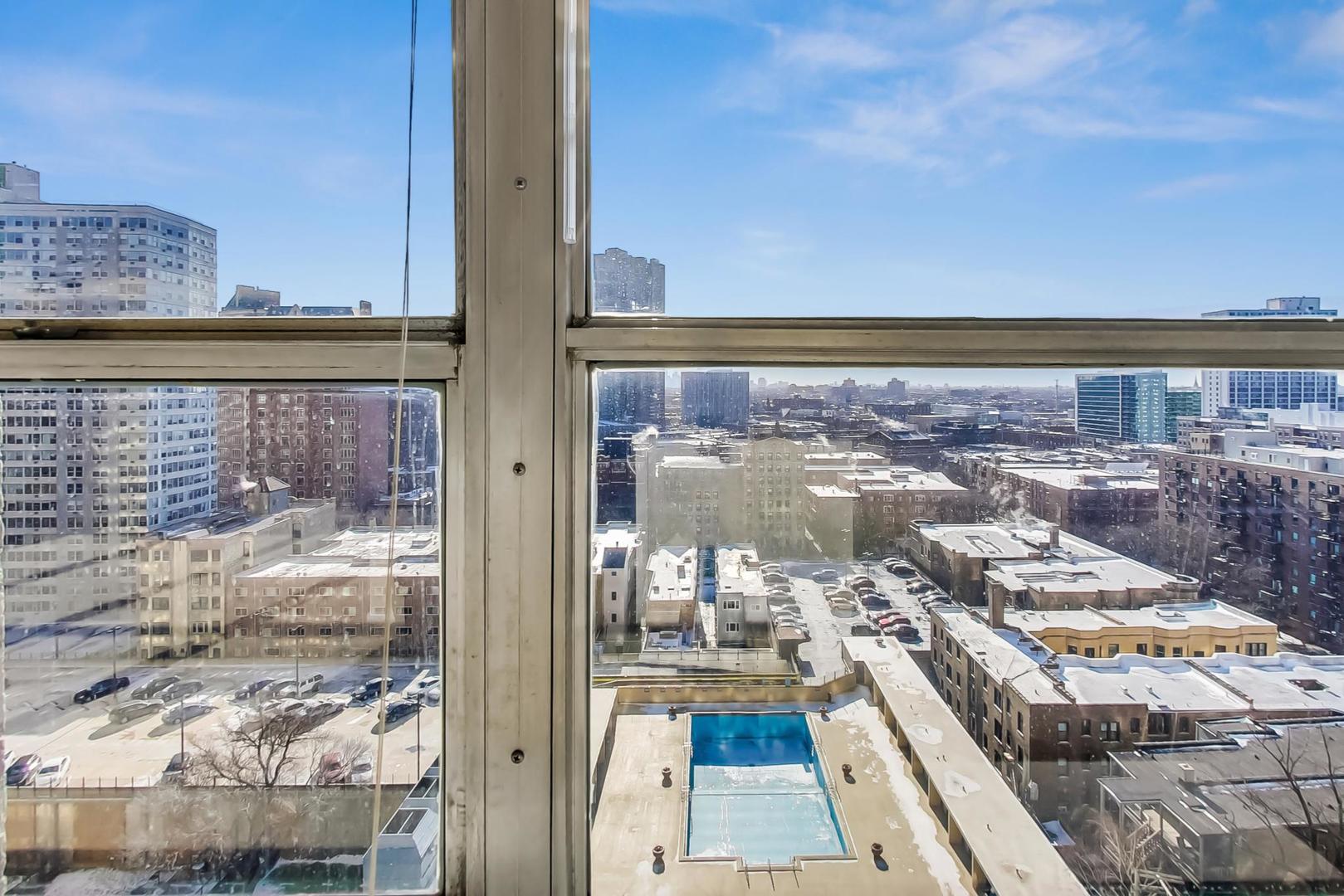 655 West Irving Park Road, Unit 1403 Chicago, IL 60613 - Photo 15 of 36 a view of a balcony with wooden floor