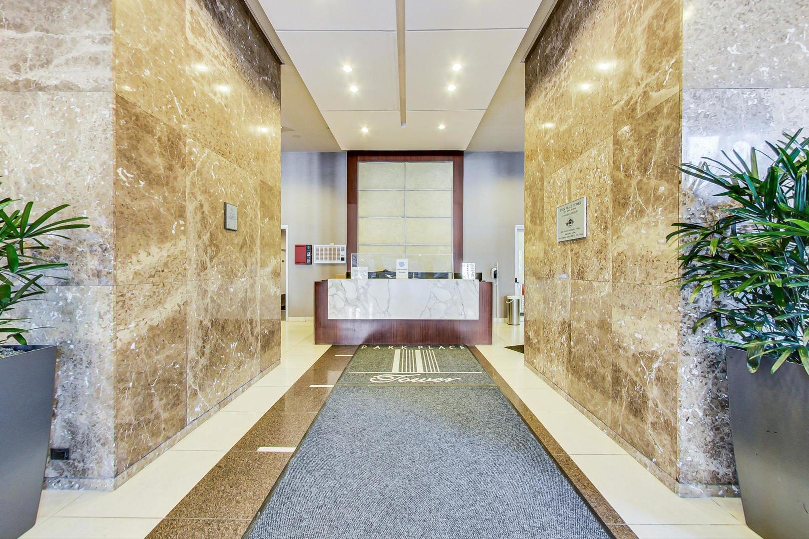 655 West Irving Park Road, Unit 1403 Chicago, IL 60613 - Photo 3 of 36 a bathroom with a bathtub and shower