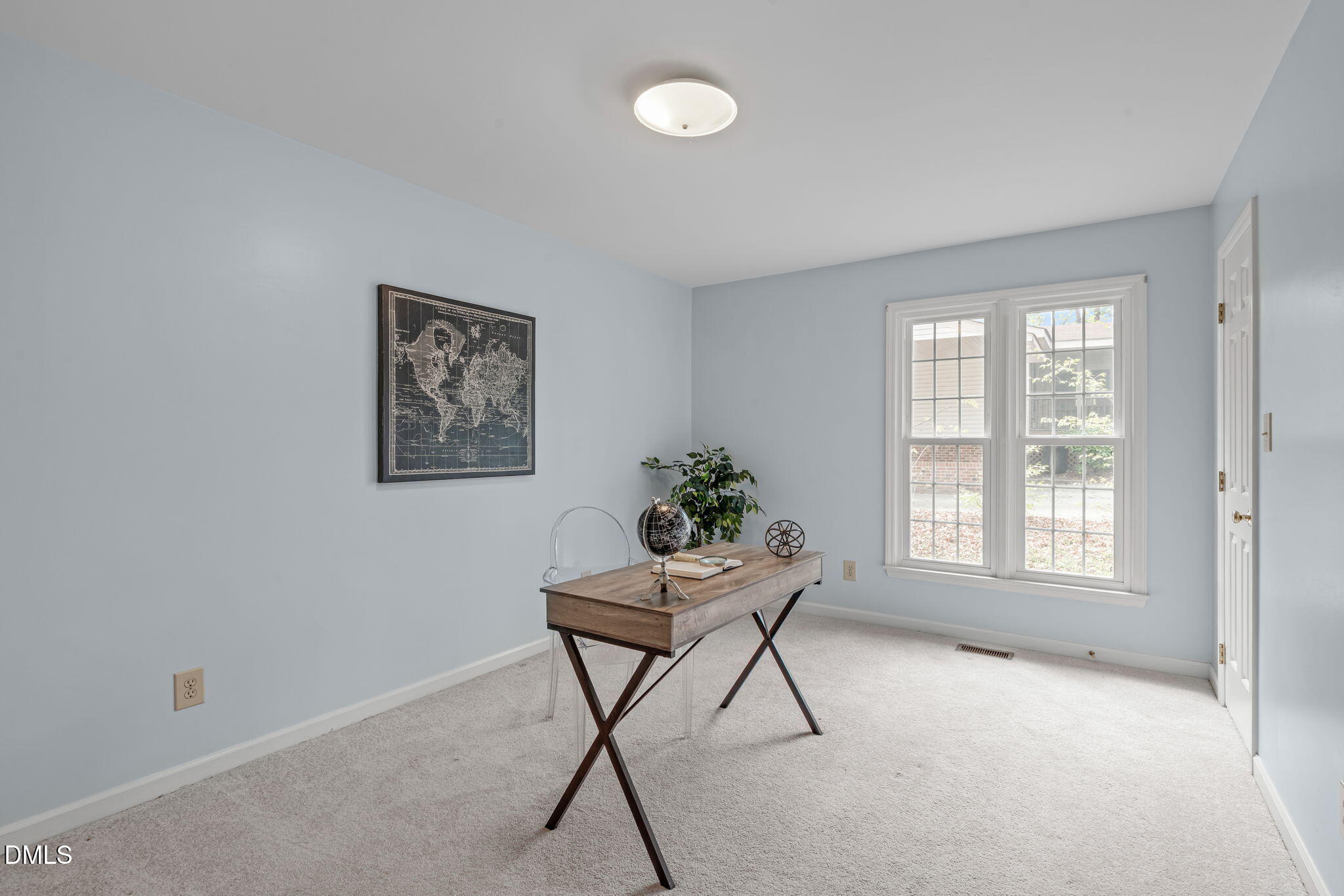 3304 Wade Avenue Raleigh, NC 27607 - Photo 25 of 38 a living room with furniture and a window