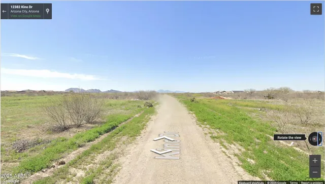 a view of an ocean and a mountain