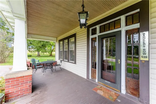 a view of a wooden floor with a sink