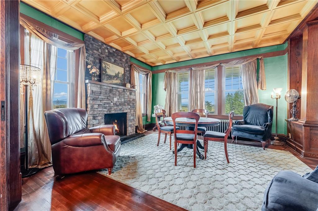 539 Main Street Addison, PA 15411 - Photo 28 of 50 a living room with furniture and a fireplace