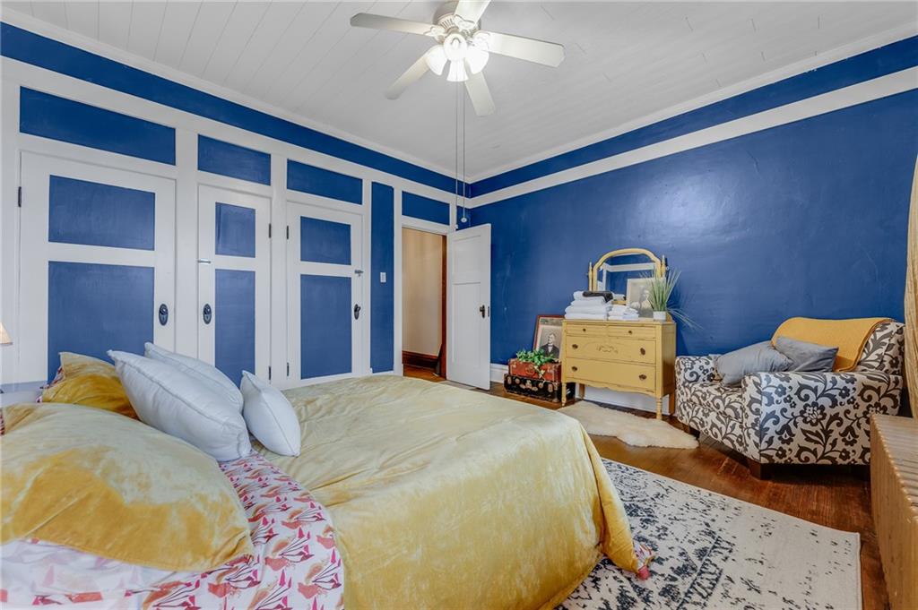 539 Main Street Addison, PA 15411 - Photo 35 of 50 a bedroom with bed and wooden floor