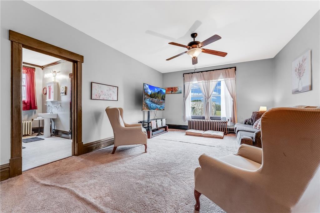 539 Main Street Addison, PA 15411 - Photo 40 of 50 a living room with furniture and a window