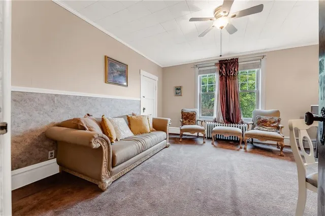 a bedroom with bed and window