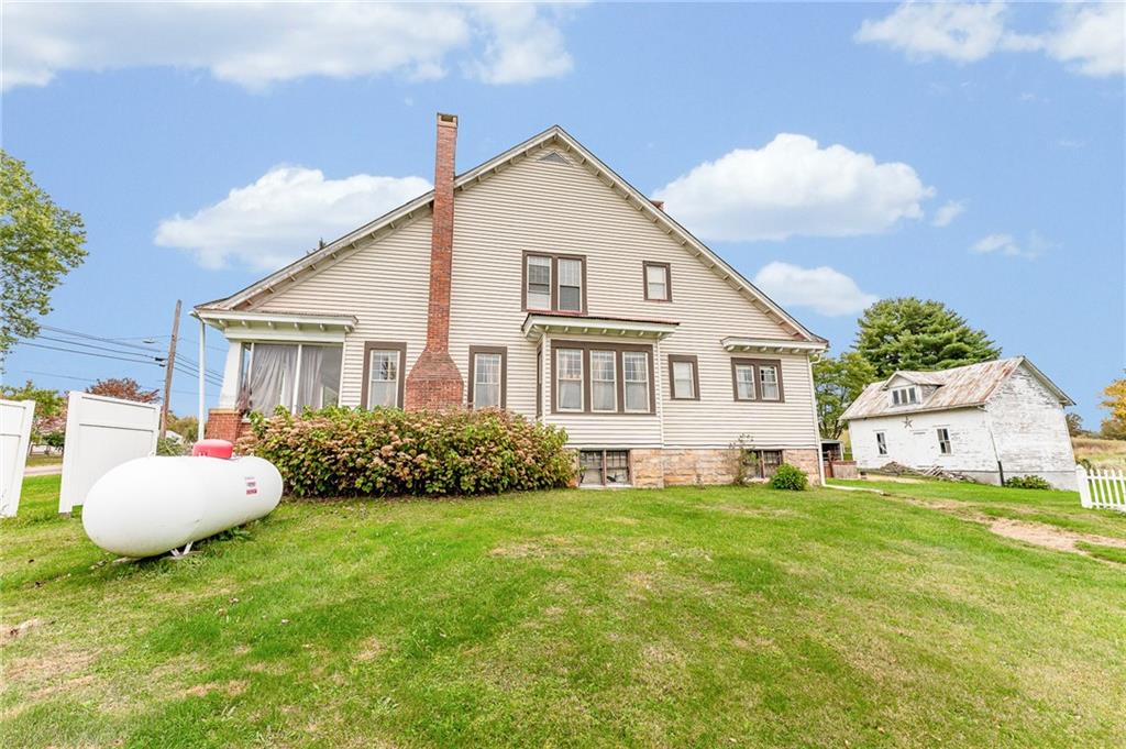 539 Main Street Addison, PA 15411 - Photo 7 of 50 a view of a house with backyard and porch