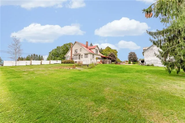 a view of a playground with basketball court