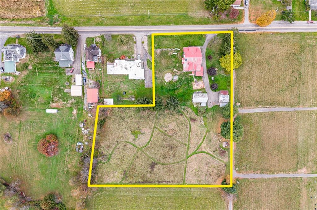 539 Main Street Addison, PA 15411 - Photo 9 of 50 a bathroom with a granite countertop shower and a mirror