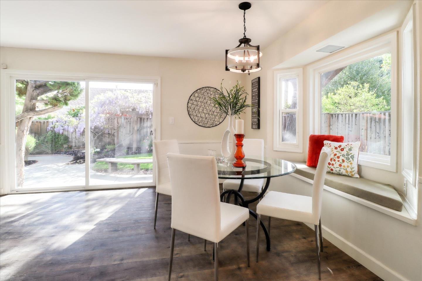 2232 Montezuma Drive Campbell, CA 95008 - Photo 14 of 34 a view of a dining room with furniture window and outside view