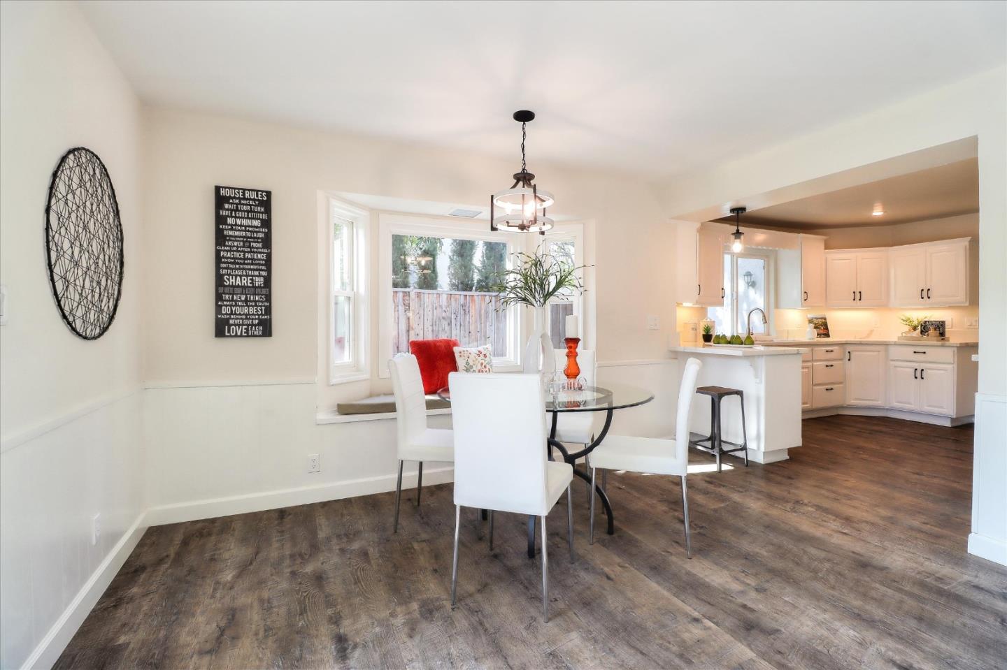 2232 Montezuma Drive Campbell, CA 95008 - Photo 15 of 34 a view of a dining room with furniture and a chandelier