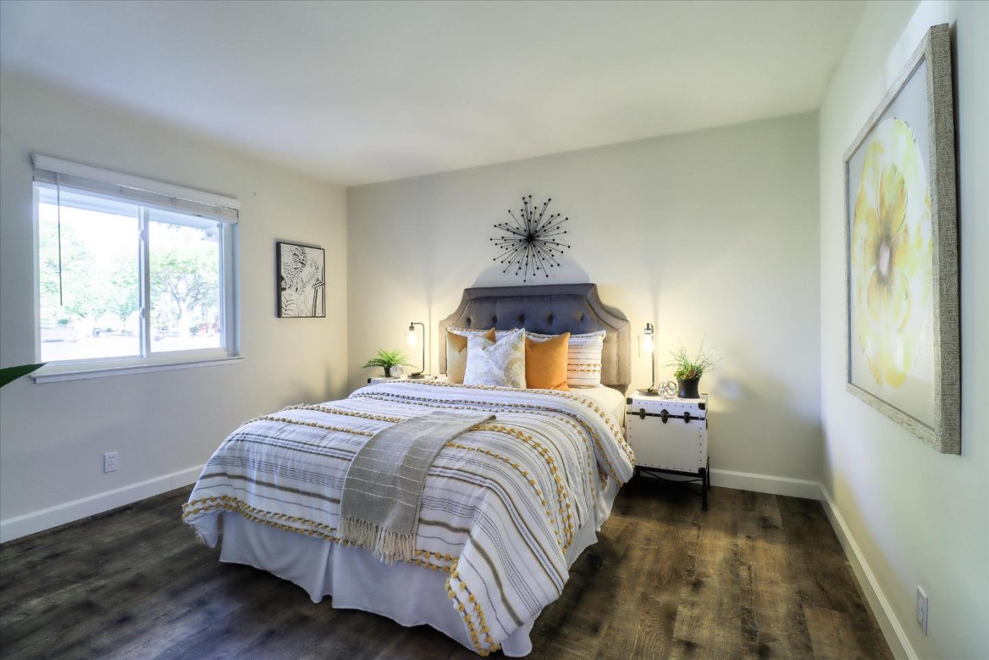 2232 Montezuma Drive Campbell, CA 95008 - Photo 16 of 34 a bedroom with a bed and window