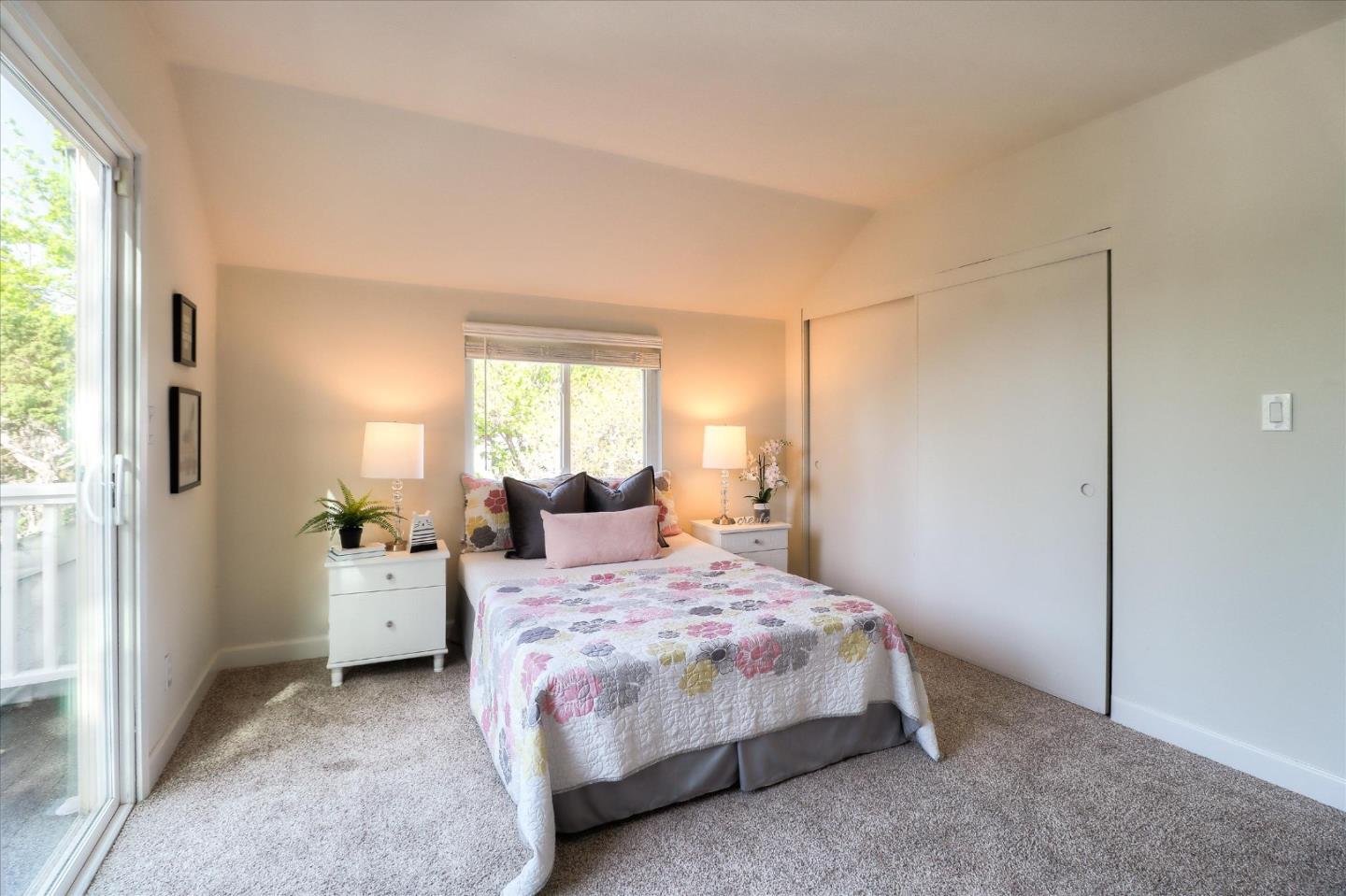 2232 Montezuma Drive Campbell, CA 95008 - Photo 18 of 34 a bedroom with a bed and wooden floor