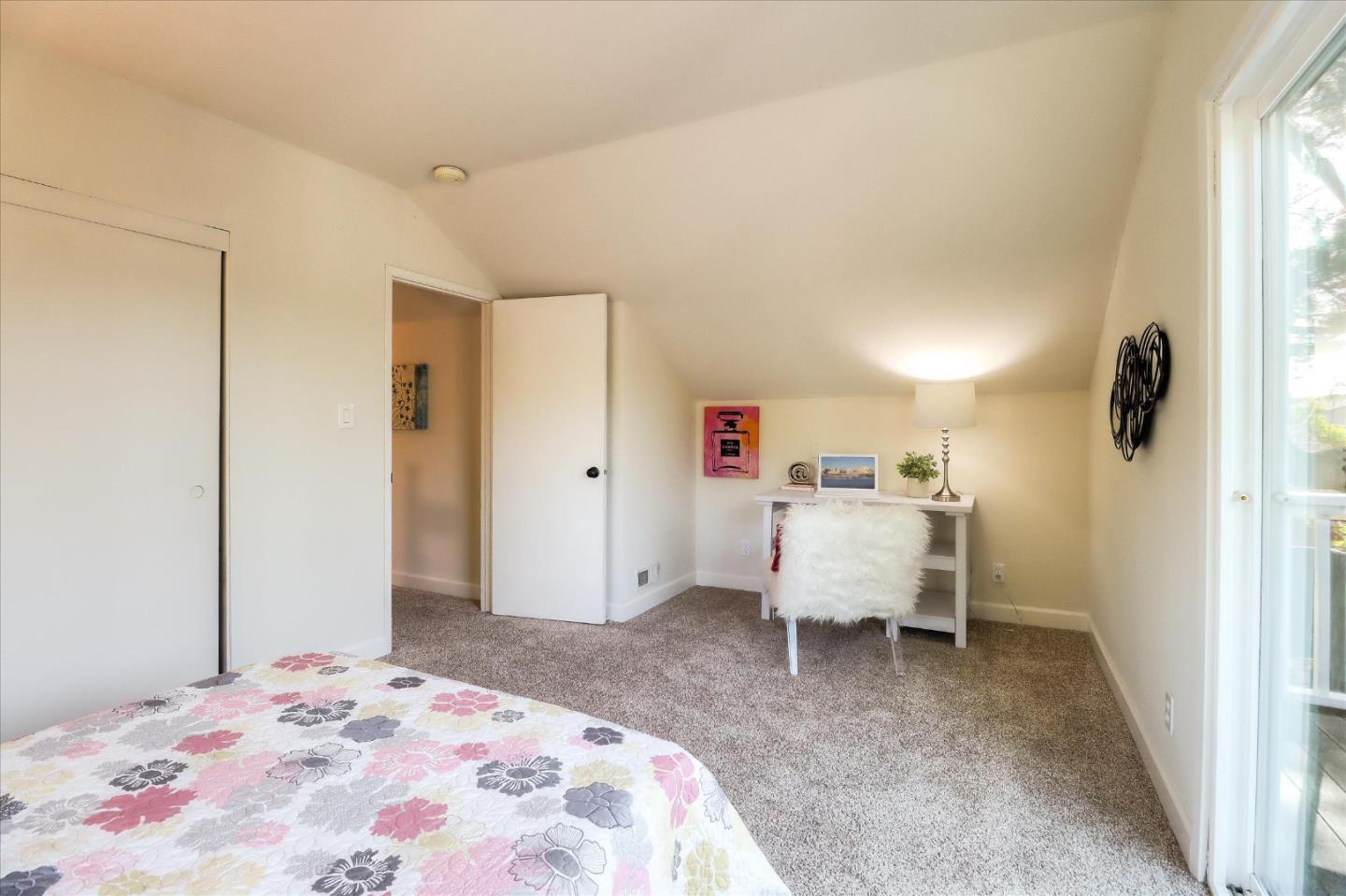 2232 Montezuma Drive Campbell, CA 95008 - Photo 19 of 34 a bedroom with a bed and a window