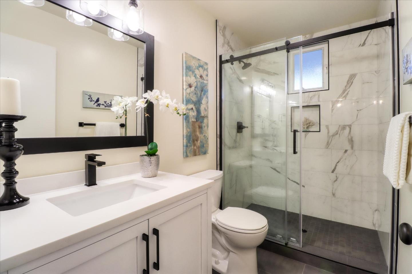 2232 Montezuma Drive Campbell, CA 95008 - Photo 24 of 34 a bathroom with a sink toilet and shower