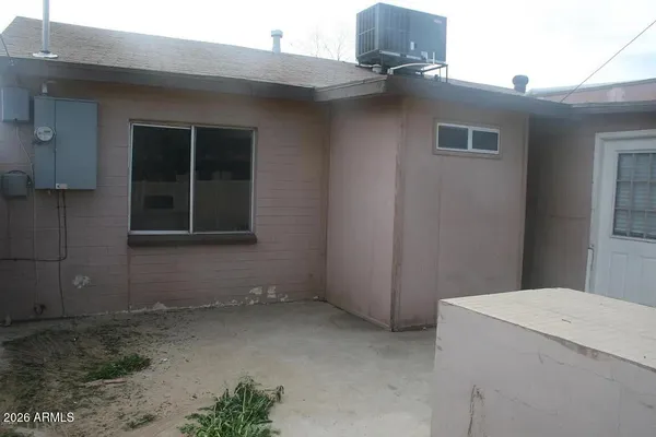 a view of an empty room and window