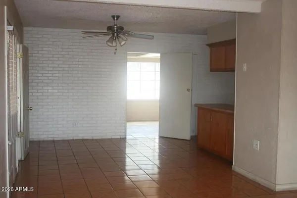 a view of a hallway with a chandelier